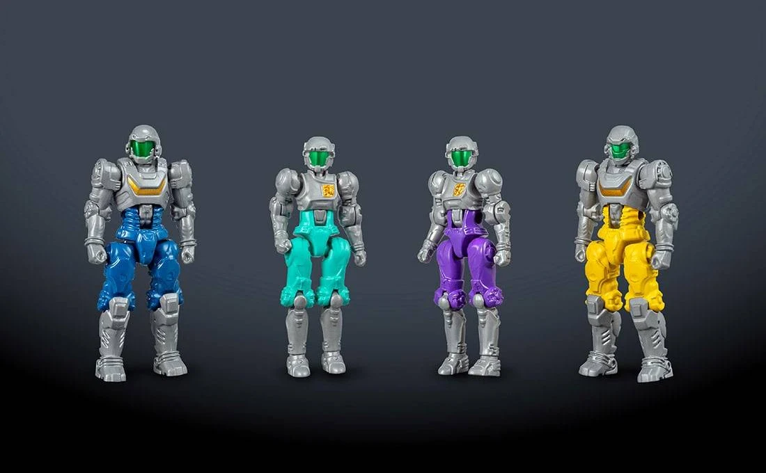 Diaclone Dia-Naut pilot figures in blue, teal, purple and yellow